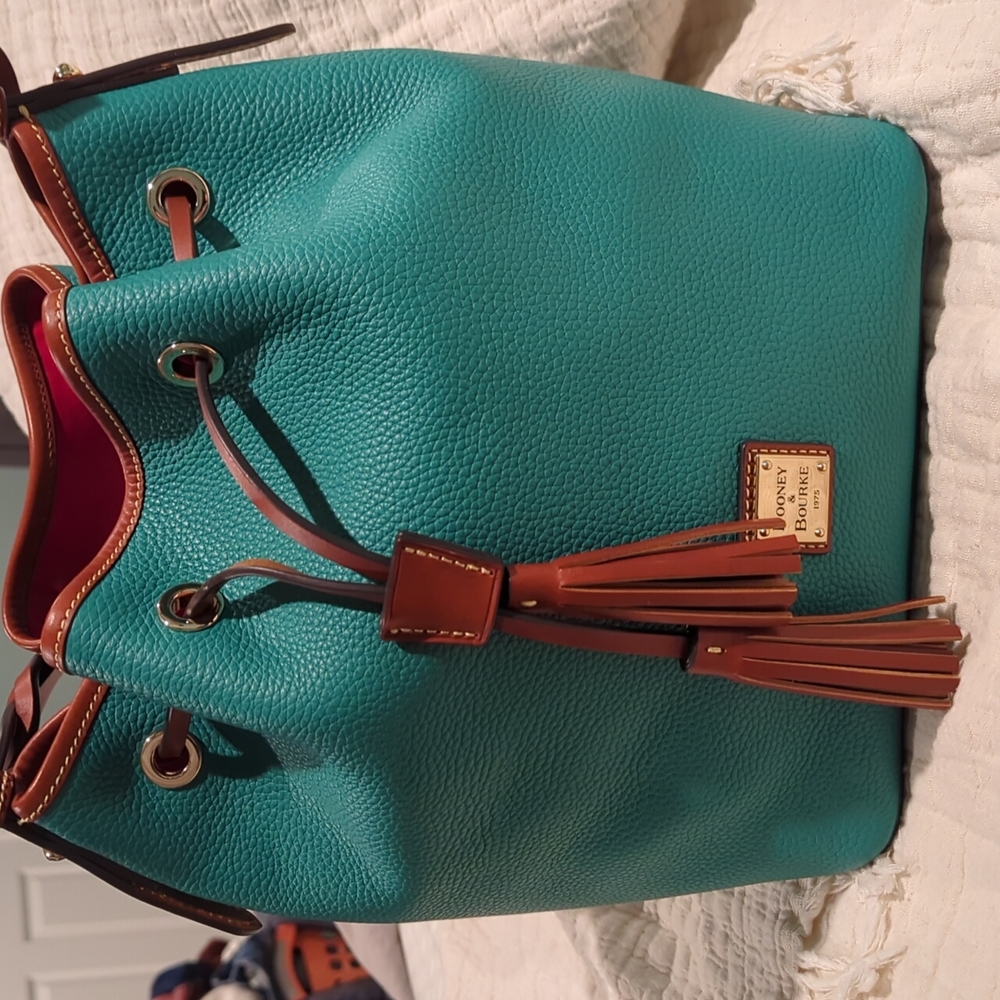 Beautiful teal Dooney and Bourke bucket purse